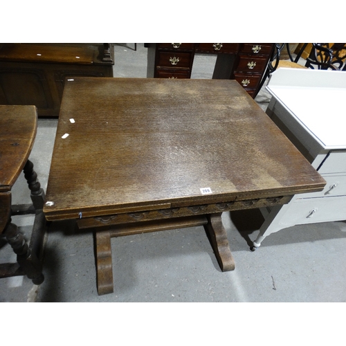 269 - An Early 20th Century Polished Oak Draw Leaf Dining Table