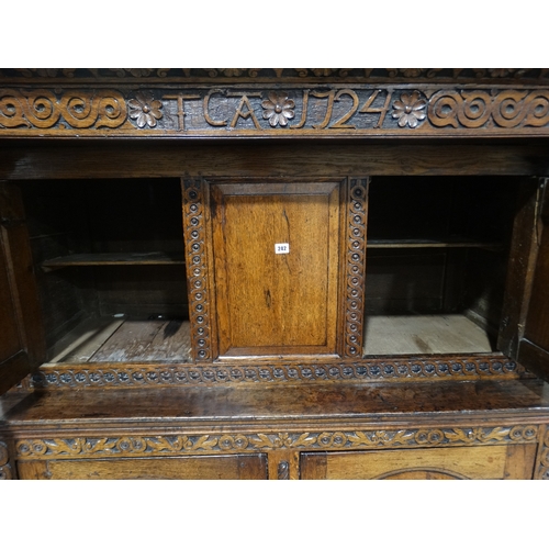 242 - An 18th Century Welsh Oak Deuddarn, The Upper Section Having Two Side Panelled Doors With A Fixed Ce... 