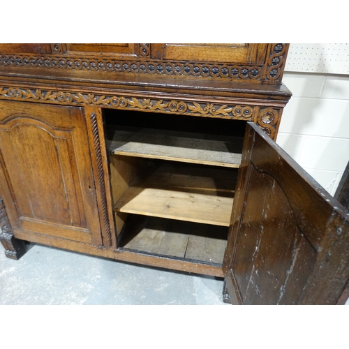 242 - An 18th Century Welsh Oak Deuddarn, The Upper Section Having Two Side Panelled Doors With A Fixed Ce... 