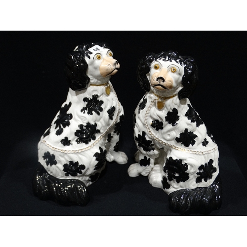 69 - A Pair Of 19th Century Staffordshire Pottery Black & White Seated Dogs, Separate Leg 13