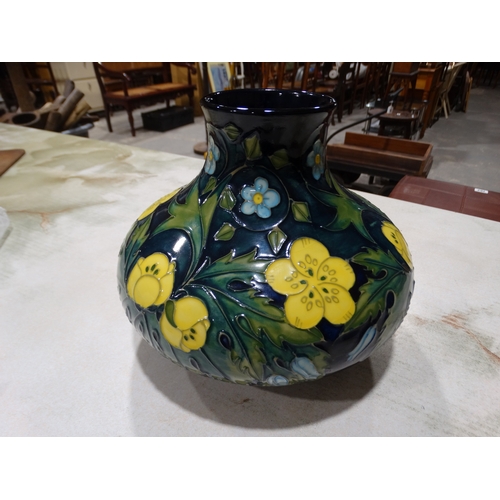 58 - A Circular Based Moorcroft Pottery Vase, The Blue Ground Decorated With Spring Flowers, 7