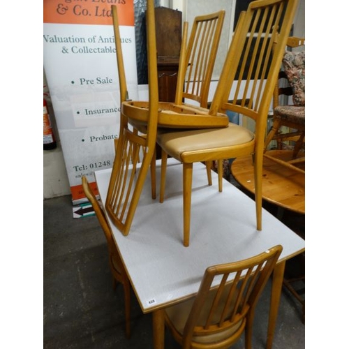 430 - A Formica Topped Kitchen Table & Six Chairs