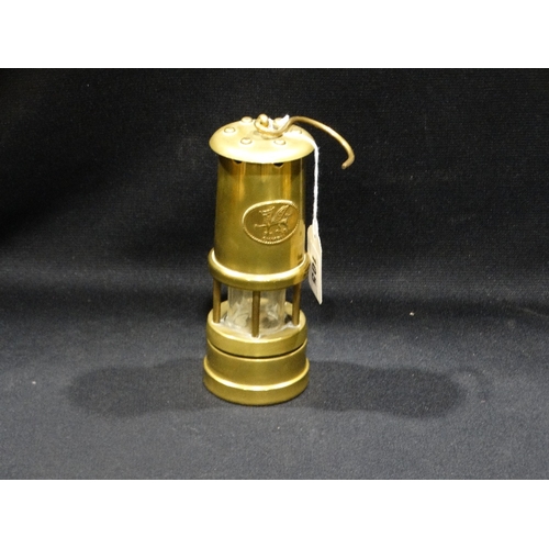 105 - A Reproduction Brass Miners Lamp With Musical Movement Playing The Welsh National Anthem