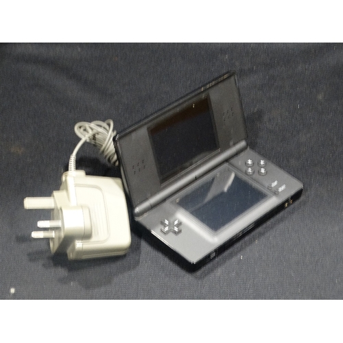 239 - A Nintendo DS Lite Console & Charger