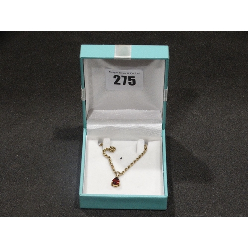 275 - A 9ct Gold Garnet Set Pendant On A 9ct Gold Rope Chain