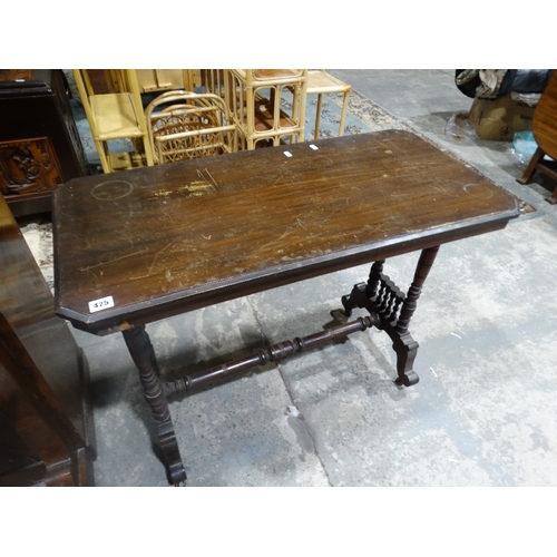 425 - An Edwardian Mahogany Side Table On Turned End Supports