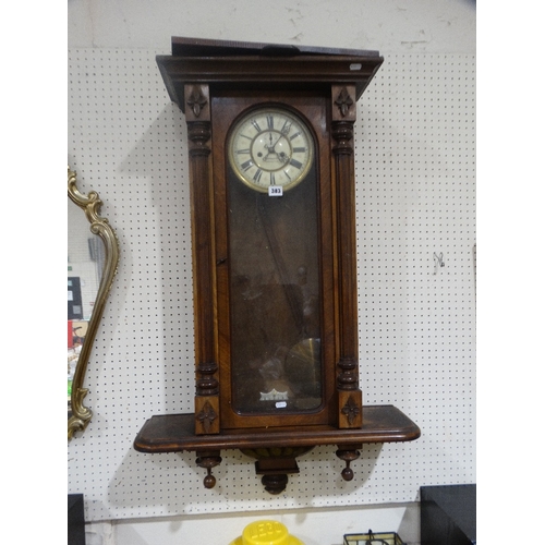 383 - A Victorian Pendulum Wall Clock With Circular Dial