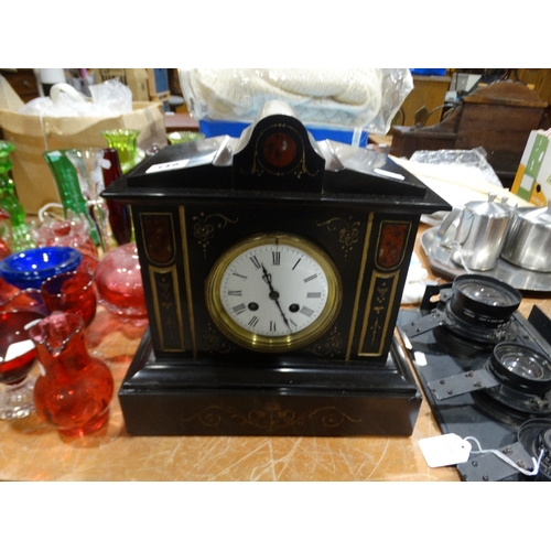 148 - A Victorian Black Marble Encased Mantel Clock With Circular Dial