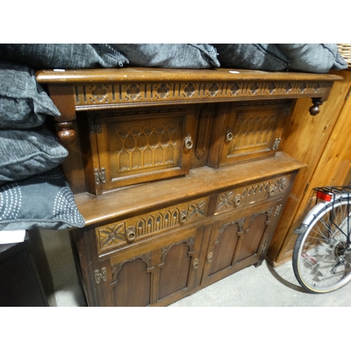 548 - A Carved Oak Court Cupboard