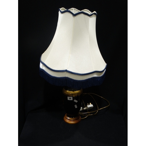 58 - A Contemporary Blue Ground & Gilt Pottery Table Lamp