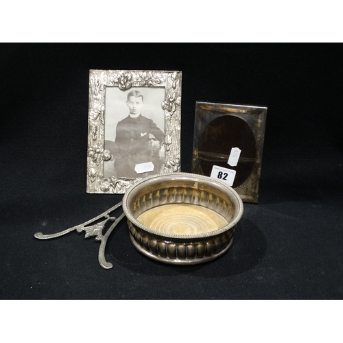 82 - A Plated Wine Coaster, Together With Two Plated Photograph Frames