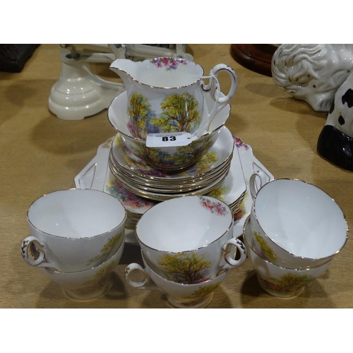 83 - A Twenty One Piece Shelly China Englands Charm Pattern Tea Set