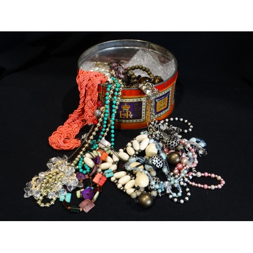 17 - A Tin Box Of Costume Jewellery