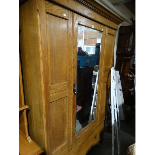 558 - A Polished Oak Mirrored Wardrobe