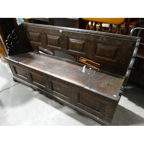 494 - An Antique Oak Box Seat Settle Bearing The Date 1604, 73