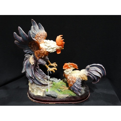 20 - A Late 20th Century Resin Group Of Fighting Cockerel