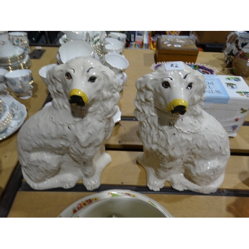 42 - A Pair Of 20th Century Staffordshire Pottery White Seated Dogs, 13