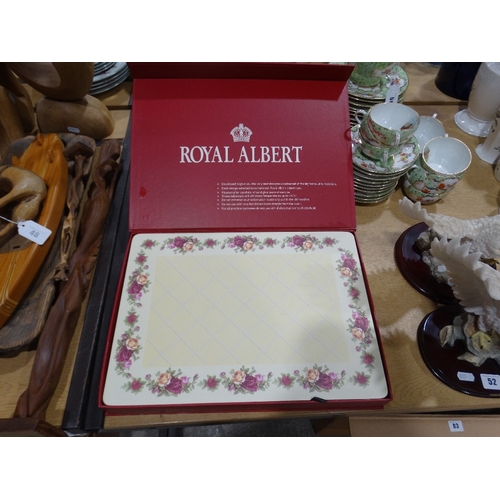 49 - A Boxed Royal Albert Place Mats, (8)