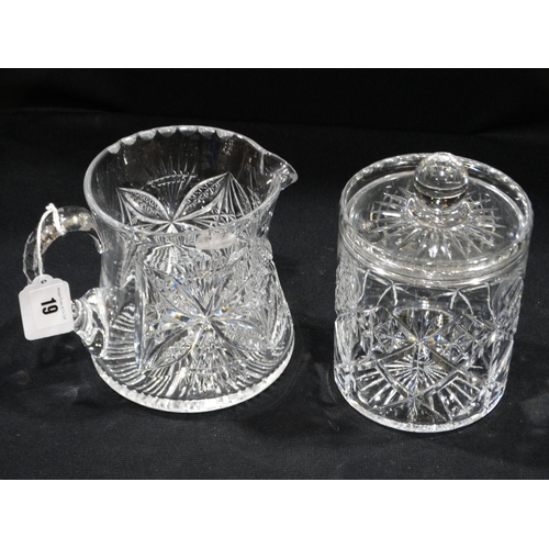 19 - A Cut Glass Water Jug And Biscuit Barrel