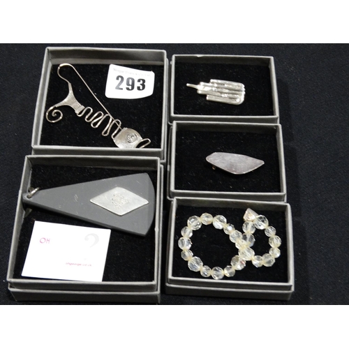 293 - A Collection Of Silver Welsh Design Brooches And Pendants