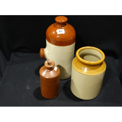 68 - A Stonware Hot Water Bottle And Two Jars