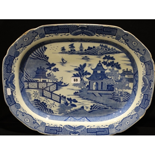 69 - A Large Willow Pattern Meat Plate, 20 Inches