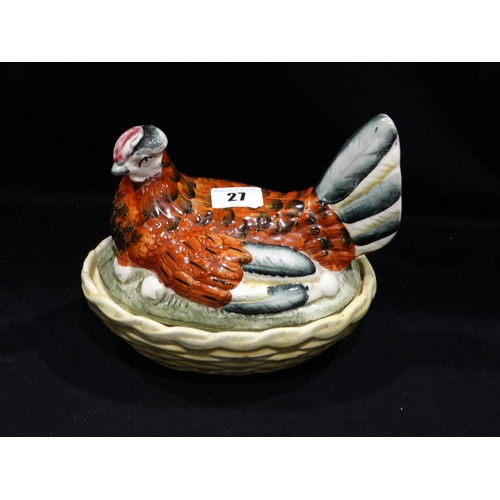 27 - A Staffordshire Pottery Hen On Nest