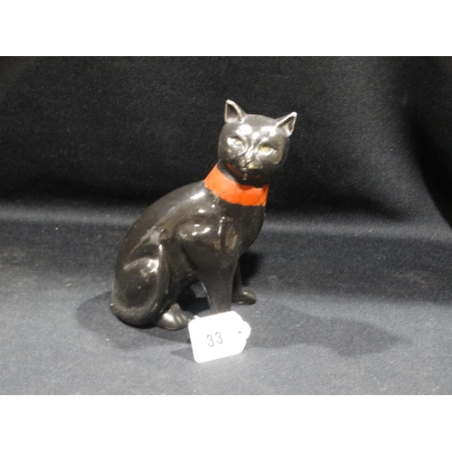 33 - A Black Pottery Seated Cat