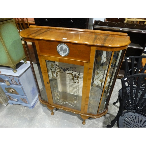 349 - A Glass Bow Front China Cabinet With Inserted Clock