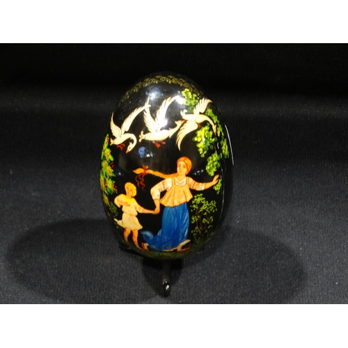 53 - A Hand Painted Russian Papier Mache Egg On Stand, Signed