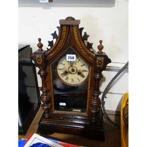 258 - An Antique Circular Dial Pendulum Clock