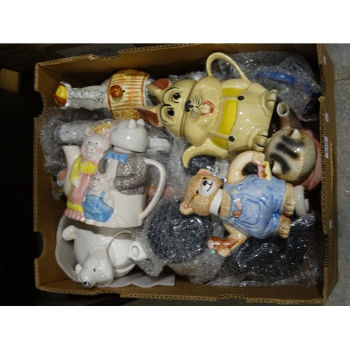 318 - A Box Of Novelty Teapots