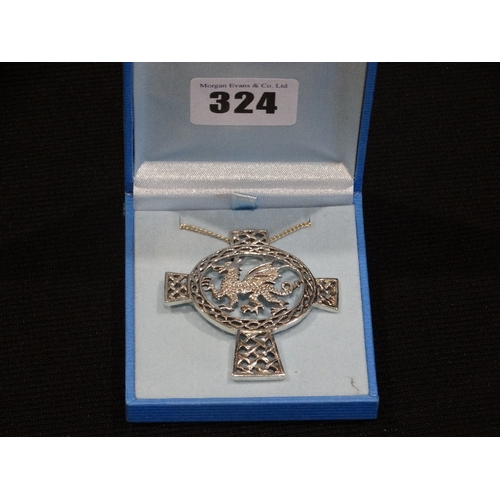 324 - A Silver Celtic Cross & Dragon Pendant