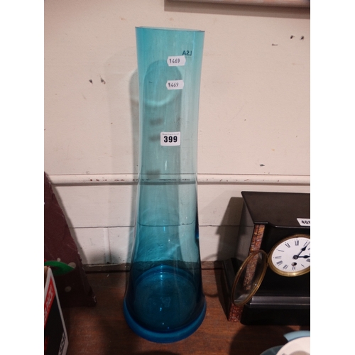 399 - A Blue Tinted Glass Flower Vase