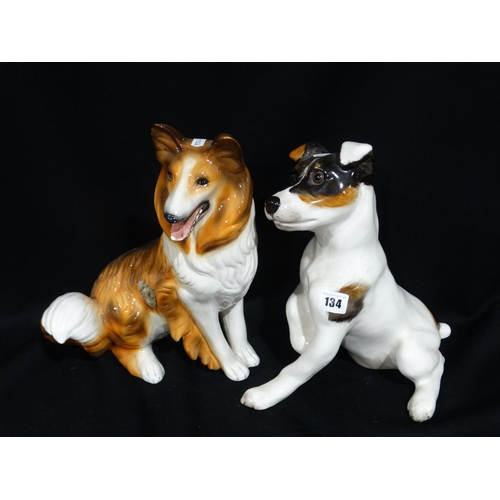 134 - Two Mid Century Pottery Fire Side Dogs