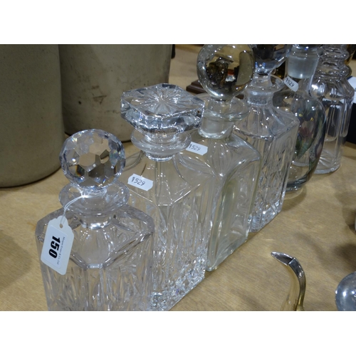 150 - Six Glass Decanters With A Qty Of Spare Stoppers