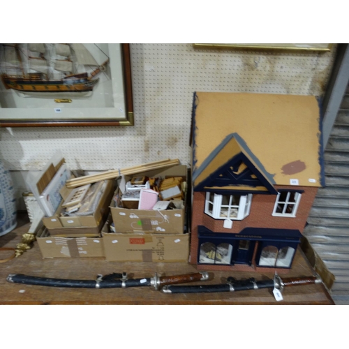 411 - A 20thc Dolls House And Furniture