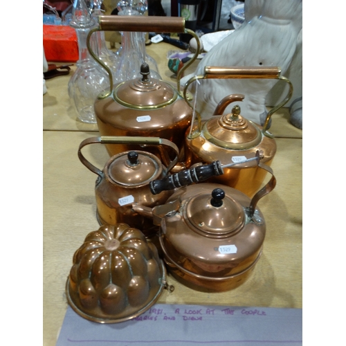15 - Four Mixed Copper Kettles, Together With A Mould