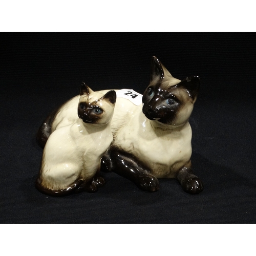 24 - Two Beswick Pottery Model Siamese Cats