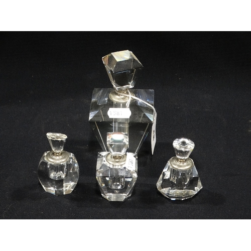 48 - A Group Of Four Glass Scent Bottles
