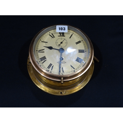 103 - An Antique Brass Framed Hezzanith Ships Clock