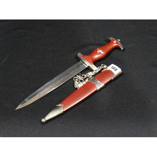 108 - A Reproduction NSDAP Dagger In Sheath With German Writing On The Blade