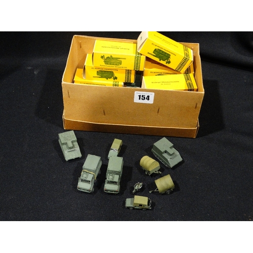 154 - A Qty Of Roskopf Boxed & Unboxed Toy Military Vehicles