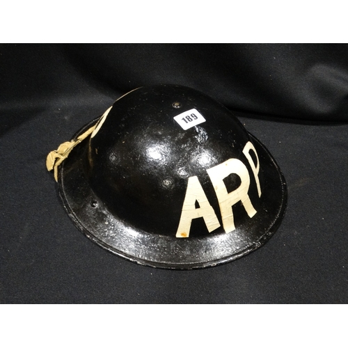 189 - A 1st World War British ARP Helmet With Webbing Strap & Original Liner