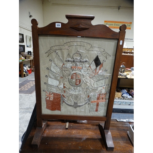 221 - An Oak Framed Fire Screen With Silkwork Regimental Panel