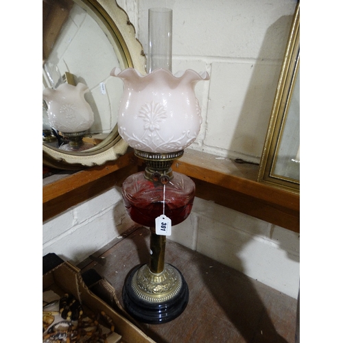 301 - A Brass Column Oil Lamp With Glass Reservoir & Pink Tinted Shade