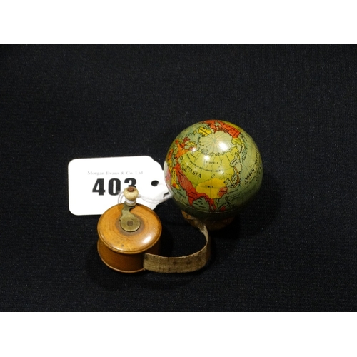 403 - A Mauchline Ware Pocket Tape Measure, Together With A Miniature Globe Pencil Sharpener