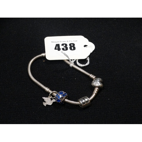 438 - A Silver Pandora Charm Bracelet With Three Charms