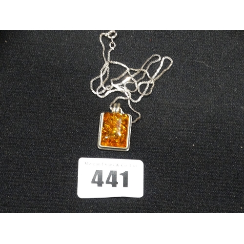 441 - A Silver & Amber Pendant & Chain