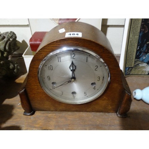 484 - A Polished Mantel Clock With Circular Dial